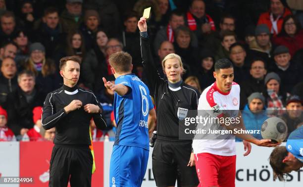 Referee Bibiana Steinhaus displayes Yellow Card for Bjoern Rother of Magdeburg during the 3. Liga match between SC Fortuna Koeln and 1. FC Magdeburg...