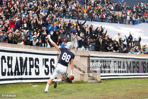 Shohfi of the Yale Bulldogs reacts after scoring a touchdown in the first half of a game against the Harvard Crimson at the Yale Bowl on November 18,...