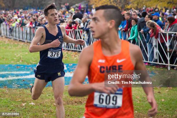 Josh Hanna of the Unites States Naval Academy runs to the finish line as Iliass Aouani of Syracuse University looks back during the Division I Men's...