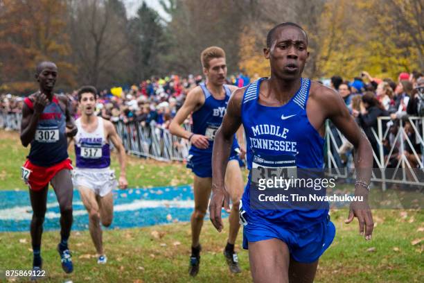 Kigen Chemadi of Middle Tennessee State University runs to the finish line during the Division I Men's Cross Country Championship held at E.P. Tom...