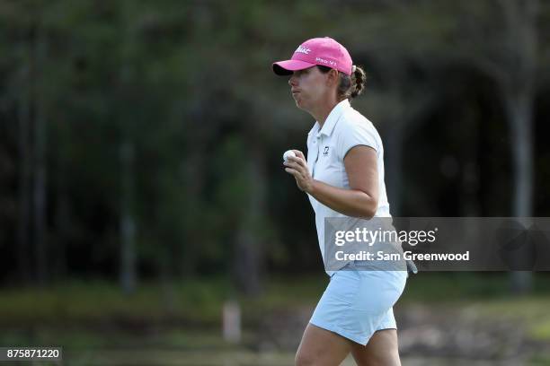 Karine Icher of France reacts after putting on the 16th green during round three of the CME Group Tour Championship at the Tiburon Golf Club on...