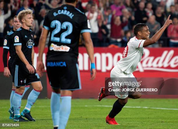 Sevilla's Colombian forward Luis Muriel celebrates a goal during the Spanish league football match Sevilla vs Celta Vigo at the Ramon Sanchez Pizjuan...