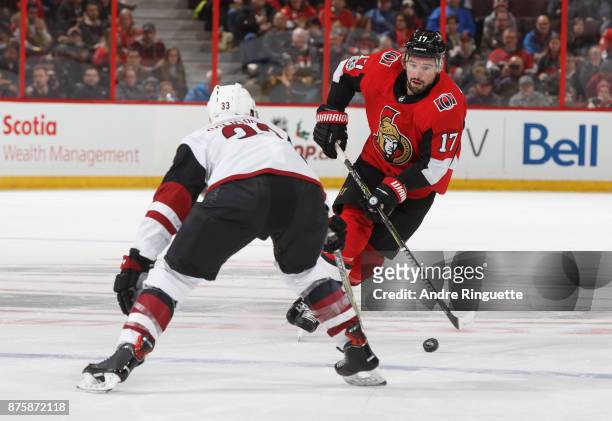 Nate Thompson of the Ottawa Senators skates up ice with the puck against Alex Goligoski of the Arizona Coyotes at Canadian Tire Centre on November...