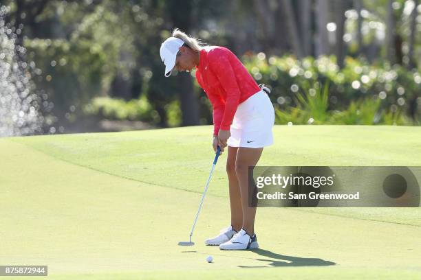 Suzann Pettersen of Norway putts for birdie on the 17th green during round three of the CME Group Tour Championship at the Tiburon Golf Club on...