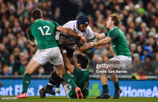 Dublin , Ireland - 18 November 2017; Nemani Nadolo of Fiji is tackled by, from left, Stuart McCloskey, Joey Carbery and Kieran Marmion of Ireland...