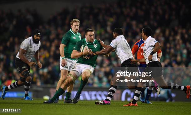Dublin , Ireland - 18 November 2017; Jack Conan of Ireland is tackled by Timoci Nagusa of Fiji during the Guinness Series International match between...