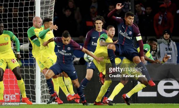 Marquinhos, Edinson Cavani and Thiago Silva of Paris Saint-Germain in action with Nicolas Pallois, Emiliano Sala and Chidozie Awaziem of FC Nantes...