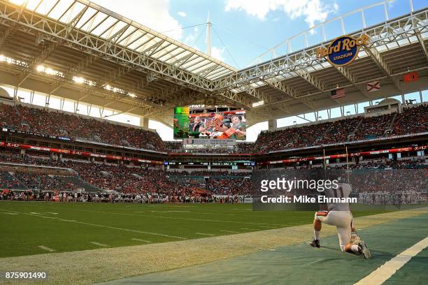 Joe Spaziani of the Virginia Cavaliers looks on during a game against the Miami Hurricanes at Hard Rock Stadium on November 18, 2017 in Miami...