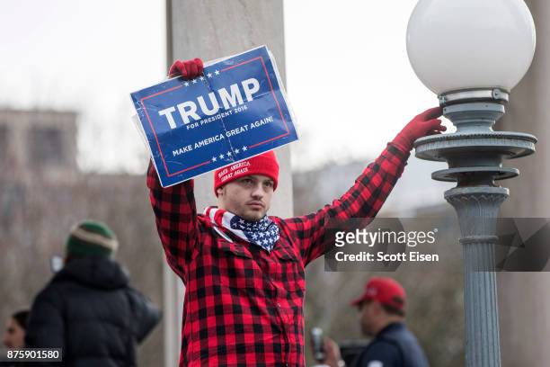 Participant of an Alt-Right organized free speech event holds a Trump campaign sign on the Boston Common on November 18, 2017 in Boston,...