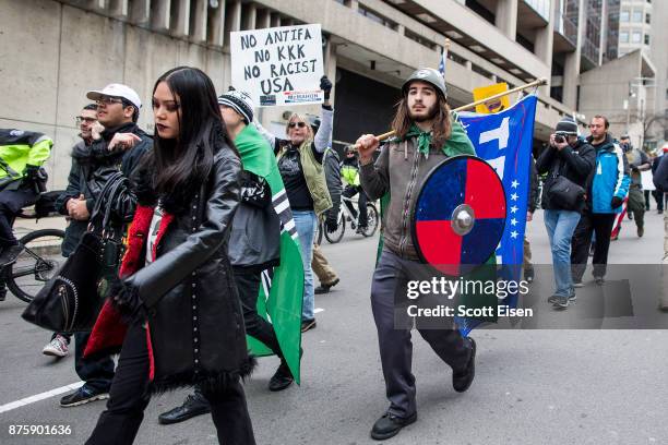 Participants of an Alt-Right organized free speech event march from the Boston Common back to their vehicles on November 18, 2017 in Boston,...