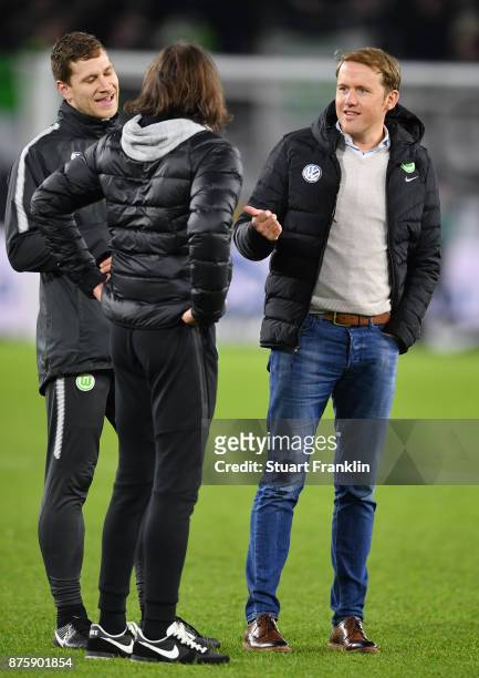 Olaf Rebbe, sports director of Wolfsburg talks with Martin Schmidt, head coach of Wolfsburg after the Bundesliga match between VfL Wolfsburg and...
