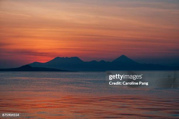 sunset at ende, flores indonesia - caroline pang stock-fotos und bilder