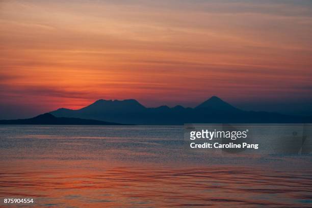 sunset at ende, flores indonesia - caroline pang stock pictures, royalty-free photos & images