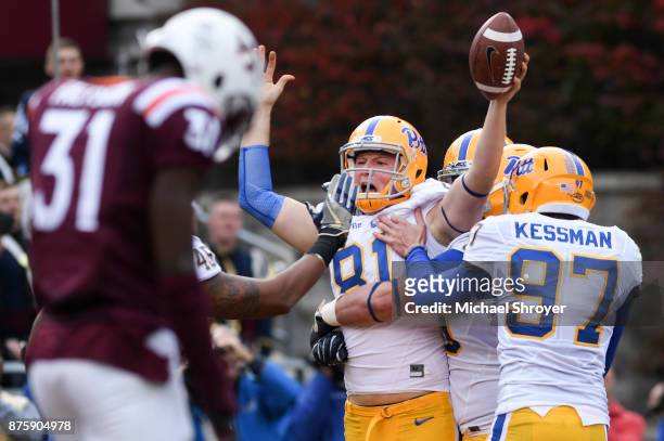 Tight end Nathan Bossory of the Pittsburgh Panthers scores a touchdown on a trick play against the Virginia Tech Hokies in the second half at Lane...