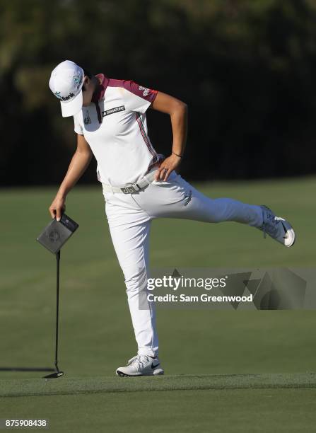 Sung Hyun Park of Korea stretches on the 17th green during round three of the CME Group Tour Championship at the Tiburon Golf Club on November 18,...