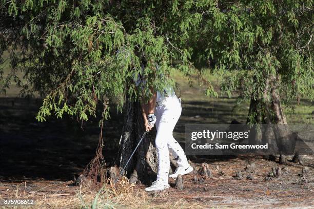 Sung Hyun Park of Korea plays a shot from the trees on the 17th hole during round three of the CME Group Tour Championship at the Tiburon Golf Club...