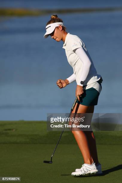 Nelly Korda of the United States reacts after putting on the 18th green during round three of the CME Group Tour Championship at the Tiburon Golf...