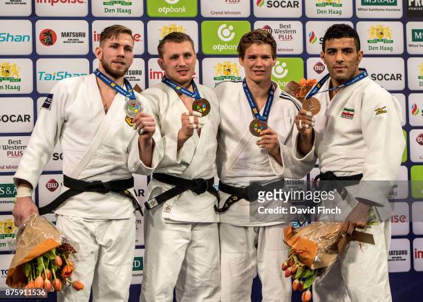 Under 81kg medallists L-R: Silver; Dominic Ressel , Gold; Ivan Vorobev , Bronzes; Matthias Casse and Saeid Mollaei during the The Hague Judo Grand...