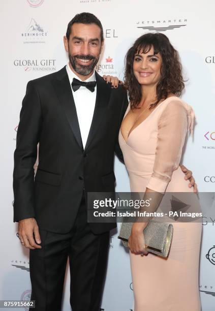 Robert Pires and Jessica Lemarie-Peres attending the Global Gift Gala held at The Corinthia Hotel in London.