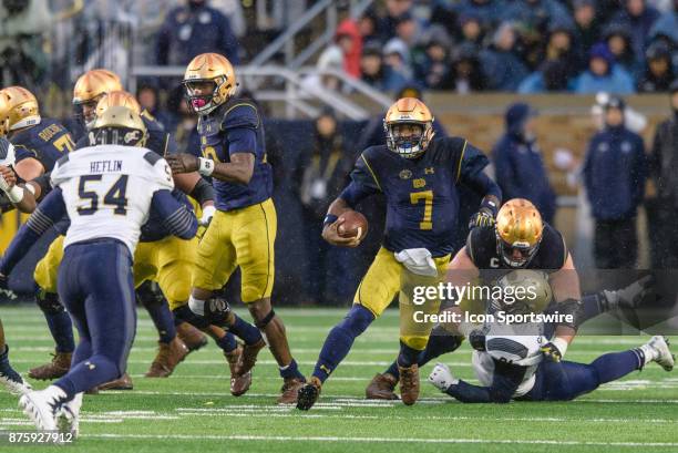 Notre Dame Fighting Irish quarterback Brandon Wimbush runs the ball in the 2nd quarter during a college football game between the Navy Midshipmen and...