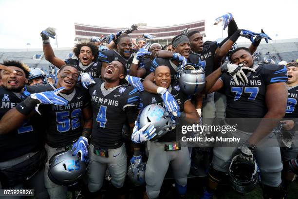 The Memphis Tigers celebrate after defeating the SMU Mustangs on November 18, 2017 at Liberty Bowl Memorial Stadium in Memphis, Tennessee. Memphis...