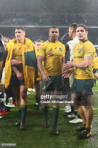 Australia captain Michael Hooper , Kurtley Beale and Sean McMahon at the final whistle during the Old Mutual Wealth Series match between England and...