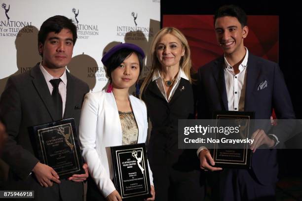 Finalists Roberto Pino Almeyda, Ewing Luo, Eisa Alhabib pose for a photo with Michal Grayevsky, President of JCS International during the Nominee...