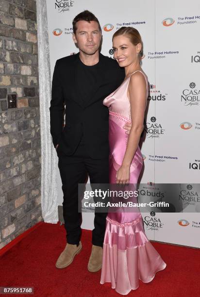 Actor Sam Worthington and wife Lara Bingle arrive at the inaugural Los Angeles gala dinner in support of The Fred Hollows Foundation at DREAM...