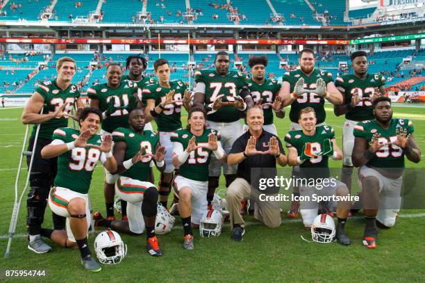 University of Miami Hurricanes Head Coach Mark Richt poses with seniors University of Miami Hurricanes Kicker Diego Marquez , University of Miami...