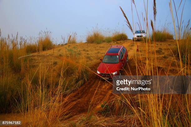 Drivers moves BMW X series cars on off track roads during the BMW xDrive Experience Tour 2017 in Jaipur, Rajasthan, India on 18 Nov, 2017.BMW...