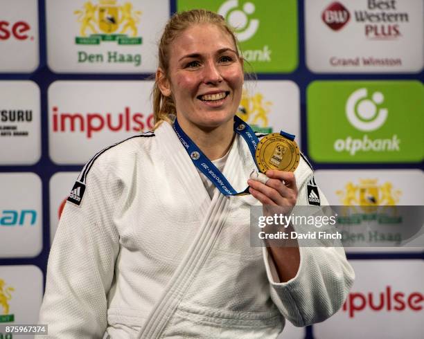 Former Junior World Champion and three times European champion, Kim Polling of the Netherlands proudly shows her under 70kg gold medal during the The...