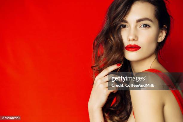 beautiful woman with stylish hairstyle - red lipstick stock pictures, royalty-free photos & images