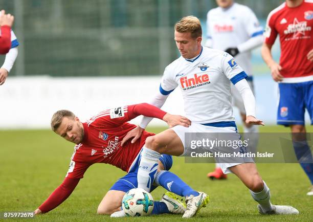 Stephan Hain of SpVgg Unterhaching and Lukas Boeder of SC Paderborn compete for the ball during the 3. Liga match between SpVgg Unterhaching and SC...