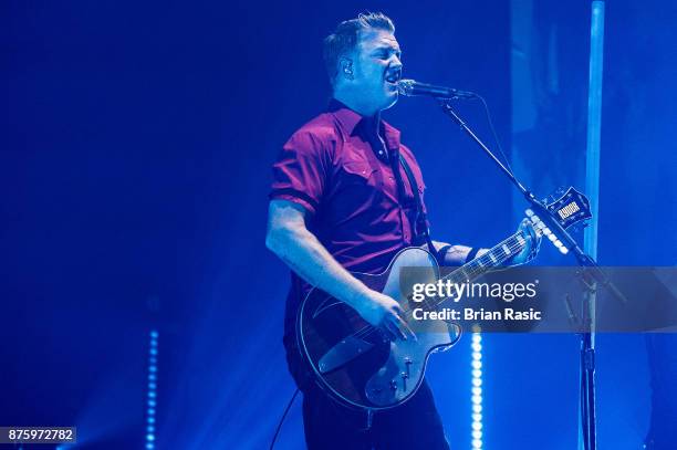 Josh Home of Queens of the Stone Age performs at Wembley Arena on November 18, 2017 in London, England.