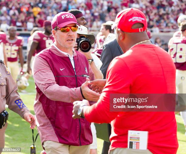 Florida State Seminoles head coach Jimbo Fisher shakes hands with Delaware State Hornets head coach Kenny Carter after the game between the Delaware...