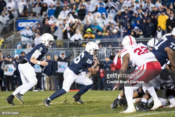 Saquon Barkley of the Penn State Nittany Lions carries the ball for a touchdown during the first quarter to gain the lead 14-10 against the Nebraska...