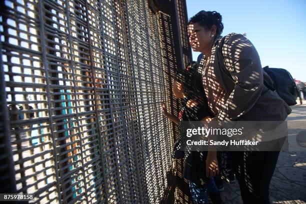 Family and griends speak to each other through the U.S. Mexico border November 18, 2017 in San Ysidro, California. The event, "Abriendo La Puerta De...