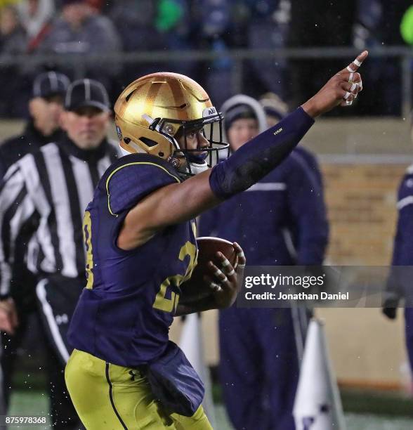Kevin Stepherson of the Notre Dame Fighting Irish celebrates scoring the game-winning touchdown against the Navy Midshipmen at Notre Dame Stadium on...