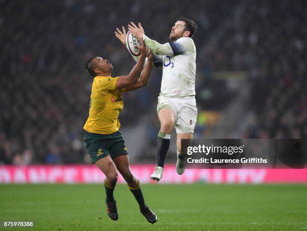 Kurtley Beale of Australia takes the high ball from Elliot Daly of England during the Old Mutual Wealth Series match between Engalnd and Australia at...