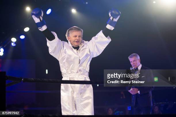 Moderator Rainer Maria Salzgeber is introduced by Michael Buffer during the 11th Laureus Charity Night at Hangar Duebendorf on November 18, 2017 near...