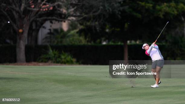 Ariya Jutanugarn of Thailand hits her approach onto the seventeenth hole during the third round of the LPGA CME Group Championship at Tiburon Golf...