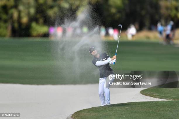 Eun-Hee Ji of South Korea plays out of the sand on the seventeenth hole during the third round of the LPGA CME Group Championship at Tiburon Golf...