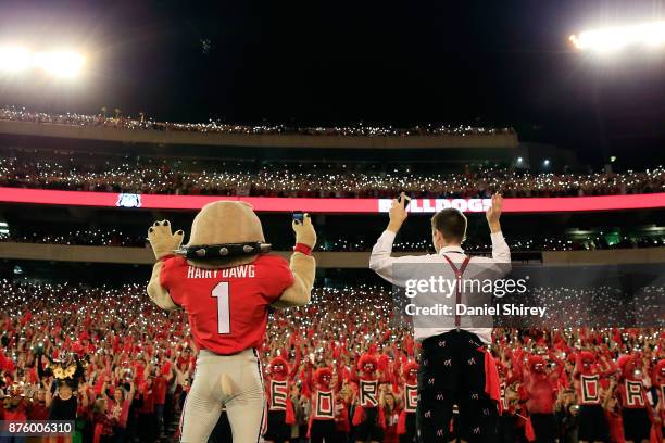 Hairy Dawg leads Georgia Bulldogs fans in the fourth quarter cheer during the second half against the Kentucky Wildcats at Sanford Stadium on...