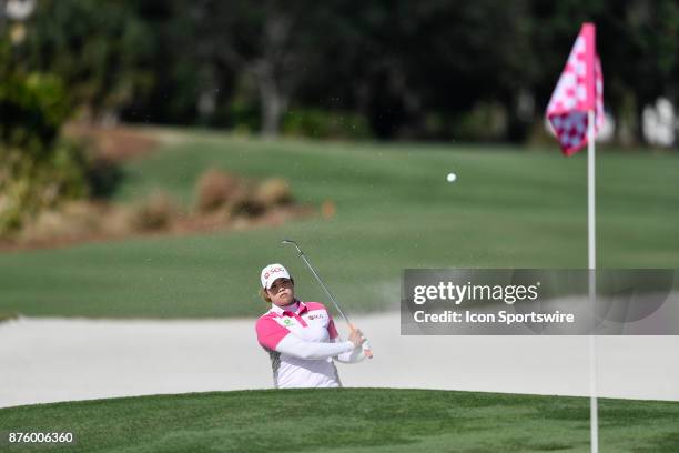 Ariya Jutanugarn of Thailand plays out of the sand on the seventeenth hole during the third round of the LPGA CME Group Championship at Tiburon Golf...