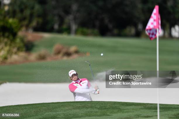 Ariya Jutanugarn of Thailand plays out of the sand on the seventeenth hole during the third round of the LPGA CME Group Championship at Tiburon Golf...