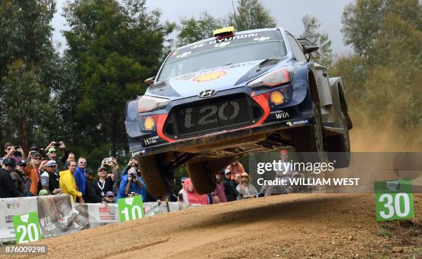 Hyundai driver Andreas Mikkelsen of Norway leaps over a jump on the final day of the World Rally Championship event Rally Australia near Coffs...