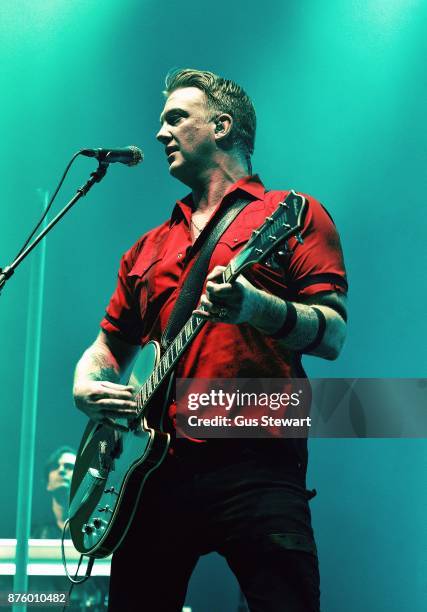 Josh Homme of Queens of the Stone Age performs on stage at Wembley Arena on November 18, 2017 in London, England.