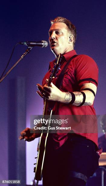 Josh Homme of Queens of the Stone Age performs on stage at Wembley Arena on November 18, 2017 in London, England.