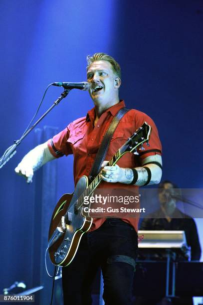 Josh Homme of Queens of the Stone Age performs on stage at Wembley Arena on November 18, 2017 in London, England.