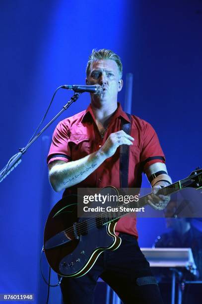 Josh Homme of Queens of the Stone Age performs on stage at Wembley Arena on November 18, 2017 in London, England.